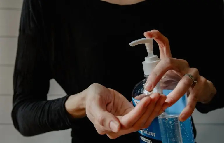 Superstition Foothills Baptist Church in Gold Canyon AZ response to the COVID-19 (Coronavirus) Situations. And image of a woman using hand sanitizer.