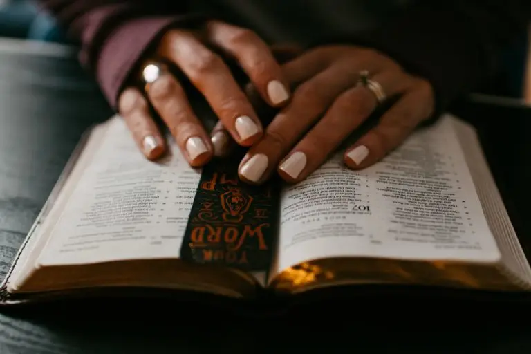 An image of a woman's hands resting on her Bible to represent the Thursday night Bible Study in Gold Canyon. Bible Study in Gold Canyon