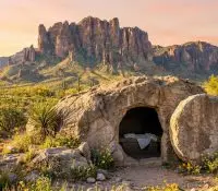 Image of the superstition mountains and an empty tomb representing Easter in Gold Canyon at Superstition Foothills Baptist Church.